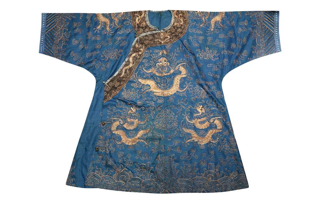 Lot 377 - A CHINESE BLUE-GROUND 'DRAGON' SUMMER ROBE.