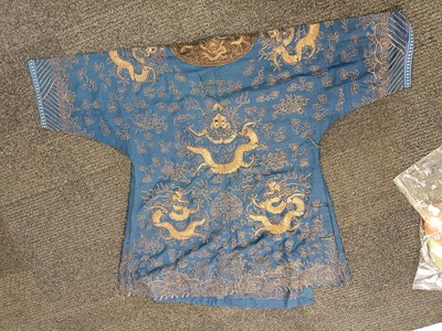 Lot 377 - A CHINESE BLUE-GROUND 'DRAGON' SUMMER ROBE.