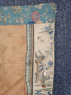 Lot 363 - A CHINESE RED-GROUND TEXTILE PANEL.