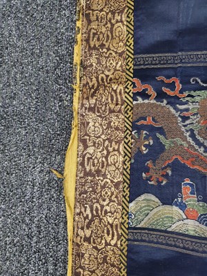 Lot 368 - A CHINESE IMPERIAL BLUE-GROUND SILK 'DRAGON'...