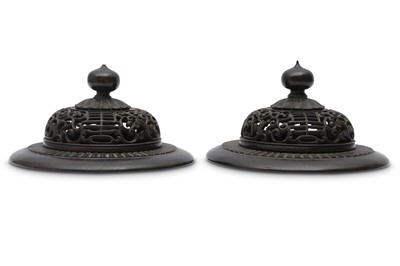 Lot 553 - A PAIR OF CHINESE WOOD COVERS.