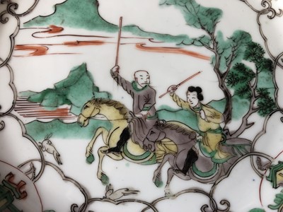 Lot 261 - A CHINESE FAMILLE VERTE 'EQUESTRIAN' DISH.