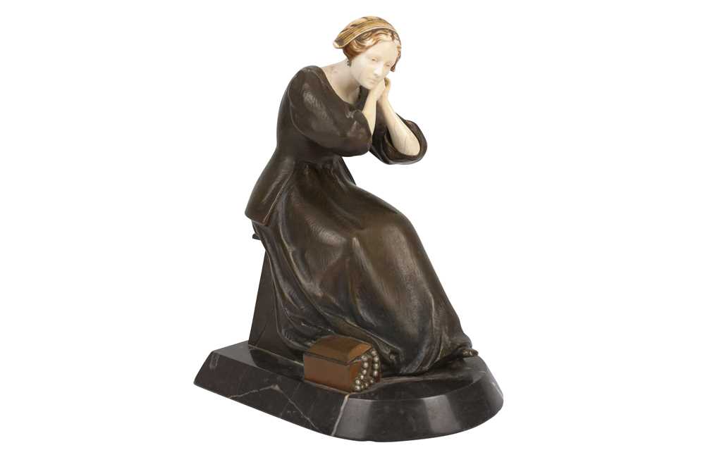 Lot 389 - A late 19th to early 20th Century bronze figure of a seated female