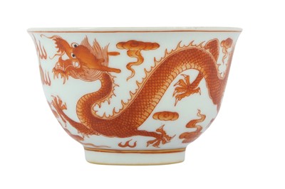 Lot 623 - A CHINESE IRON RED 'DRAGON' CUP.
