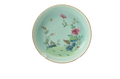 Lot 714 - A CHINESE FAMILLE ROSE CELADON-GROUND 'QUAILS' DISH.