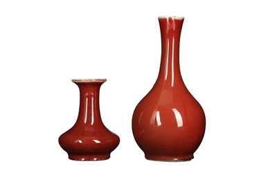 Lot 711 - TWO CHINESE OX BLOOD-GLAZED VASES.