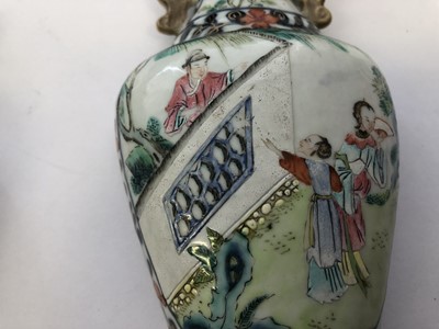 Lot 571 - A PAIR OF CHINESE FAMILLE ROSE WALL VASES.