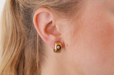 Lot 16 - A pair of diamond earrings