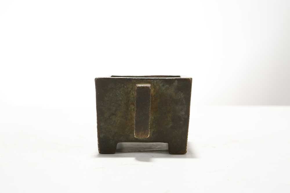Lot 176 - A CHINESE BRONZE RECTANGULAR CENSER. Resting