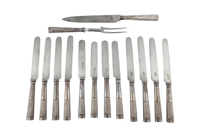 Lot 73 - A set of twelve George III sterling silver table knives and a carving set, London 1808 by Moses Brent