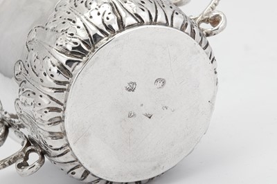 Lot 475 - A Charles II sterling silver porringer, London 1682 by Thomas Cooper (free 1668. d. c. 1693)