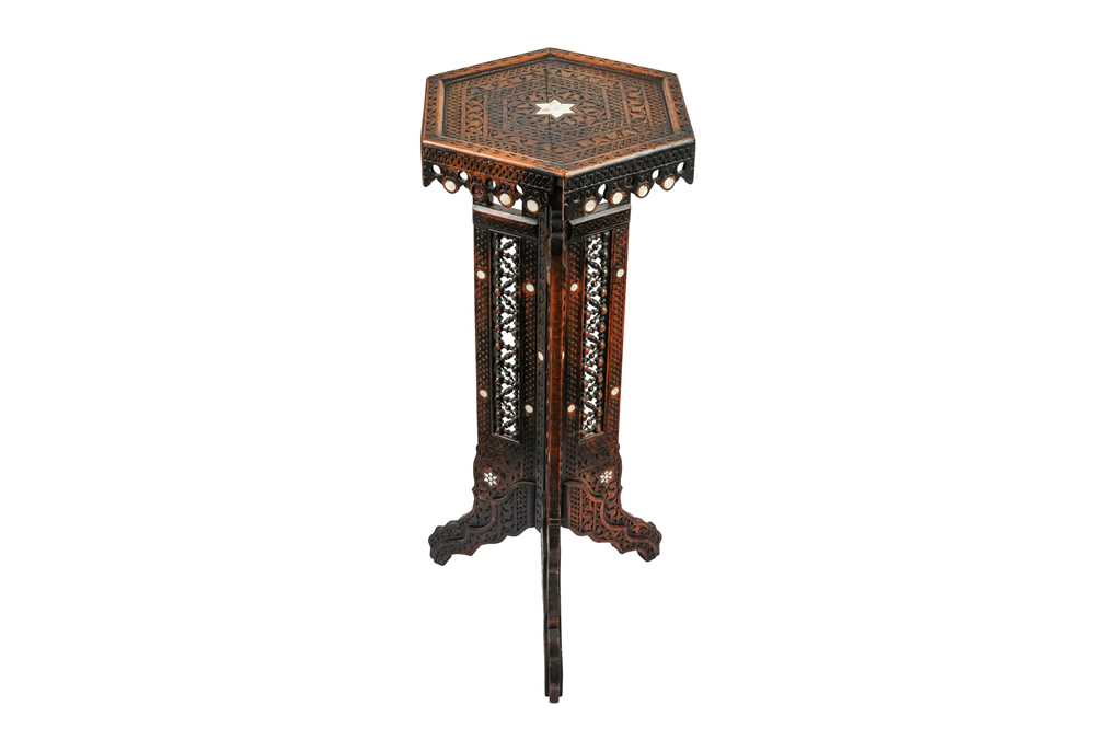 Lot 222 - λ A HARDWOOD MOTHER-OF-PEARL-INLAID TALL HEXAGONAL STAND