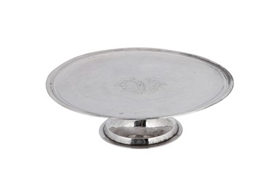 Lot 470 - A George I Britannia standard silver footed salver (tazza), London 1714 by William England and John Vaen (reg. 22nd July 1714)