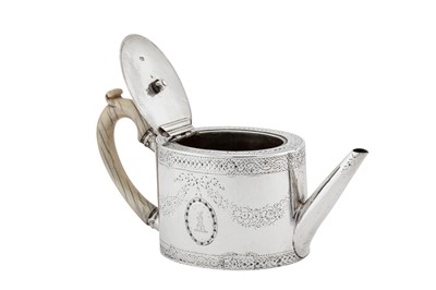Lot 439 - A George III sterling silver teapot, London 1779 by Thomas Daniell
