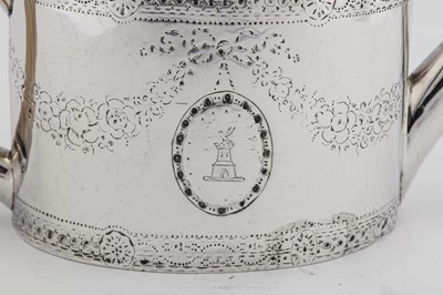 Lot 439 - A George III sterling silver teapot, London 1779 by Thomas Daniell