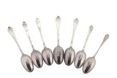 Lot 314 - A set of seven Queen Anne Britannia standard silver dessert spoons, London 1706/07 by Thomas Sadler (reg. 25th Aug 1701)