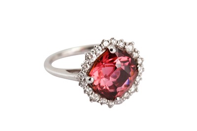Lot 117 - A pink tourmaline and diamond cluster ring