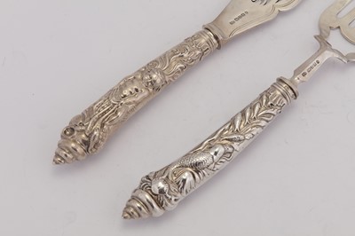 Lot 297 - A pair of Victorian sterling silver fish servers, Sheffield 1873 by Joseph Rodgers & Sons