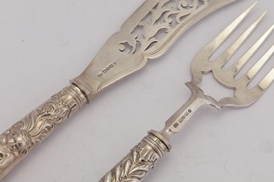 Lot 297 - A pair of Victorian sterling silver fish servers, Sheffield 1873 by Joseph Rodgers & Sons