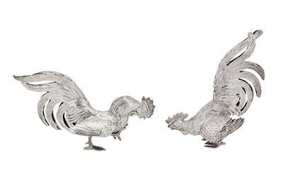 Lot 265 - A pair of late 20th century Spanish sterling silver table ornament fighting cocks, import marks for London 1969 by F & Sons