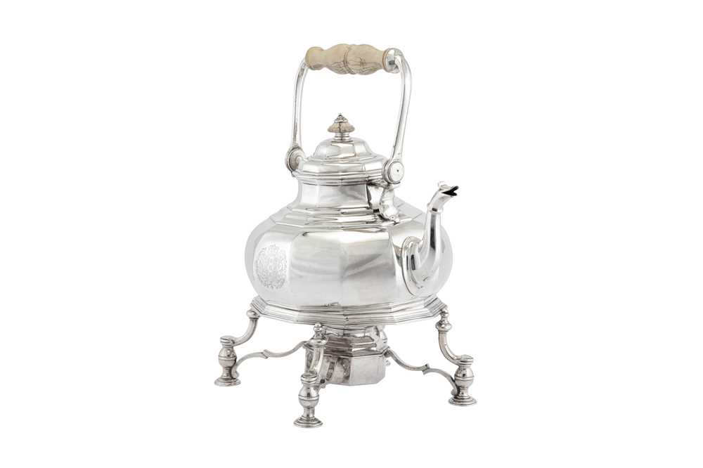 Lot 472 - A Queen Anne Britannia standard silver kettle on burner stand, London 1713 by Augustine Courtauld (reg. 23 Dec 1708)