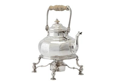 Lot 472 - A Queen Anne Britannia standard silver kettle on burner stand, London 1713 by Augustine Courtauld (reg. 23 Dec 1708)