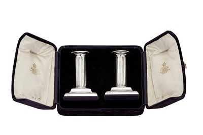 Lot 326 - A cased pair of Edwardian sterling silver dwarf or desk candlesticks, Sheffield 1901 by Hawksworth, Eyre & Co Ltd