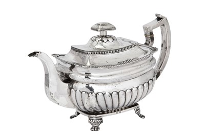 Lot 424 - Hallmarking Interest – A George III Irish sterling silver teapot, Dublin 1811 by Richard Sawyer