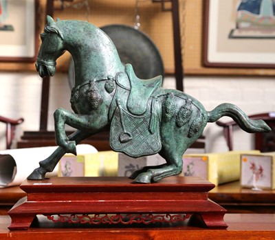 Lot 368 - A verdigris bronze figure of a Tang horse...