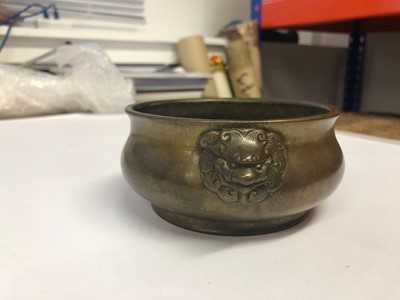 Lot 59 - A CHINESE BRONZE 'LION HEAD' INCENSE BURNER.