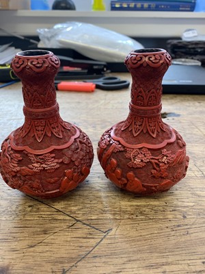 Lot 43 - A PAIR OF CHINESE CINNABAR LACQUER 'SCHOLARS' GARLIC MOUTH VASES.