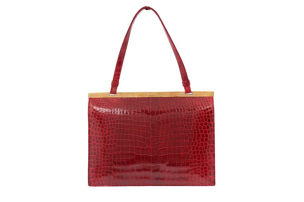 A SHINY RED CROCODILE TOP HANDLE BAG WITH GOLD HARDWARE, CHANEL,  1997-1999FROM THE COLLECTION OF SUSAN CASDEN | Christie's