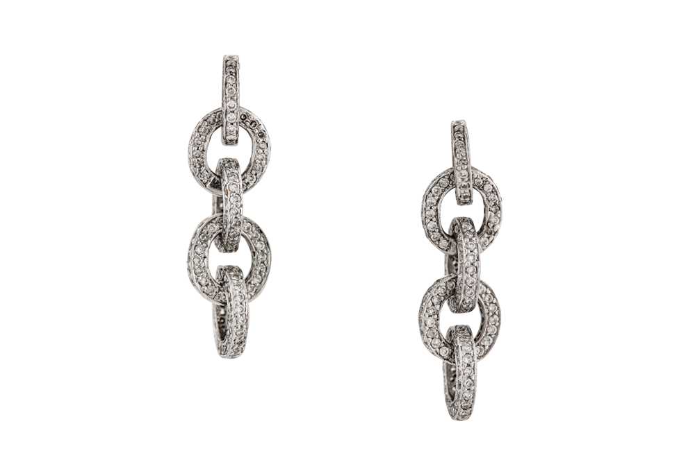 Lot 86 - A pair of diamond pendant earrings