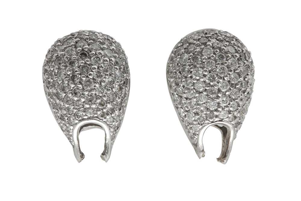 Lot 1226 - A pair of diamond earrings