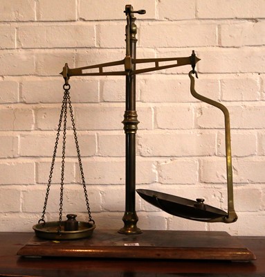 Lot 369 - A set of brass and mahogany balance scales and...