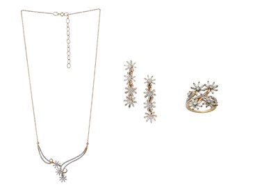 Lot 1274 - A gold and diamond necklace, ring and earring suite