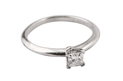 Lot 29 - A diamond single-stone ring, by Tiffany & Co.