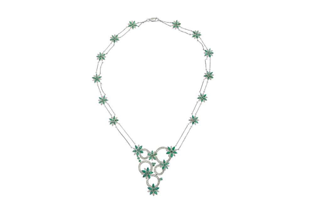 Lot 1222 - An emerald and diamond pendant necklace