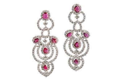 Lot 2 - A pair of ruby and diamond pendent earrings