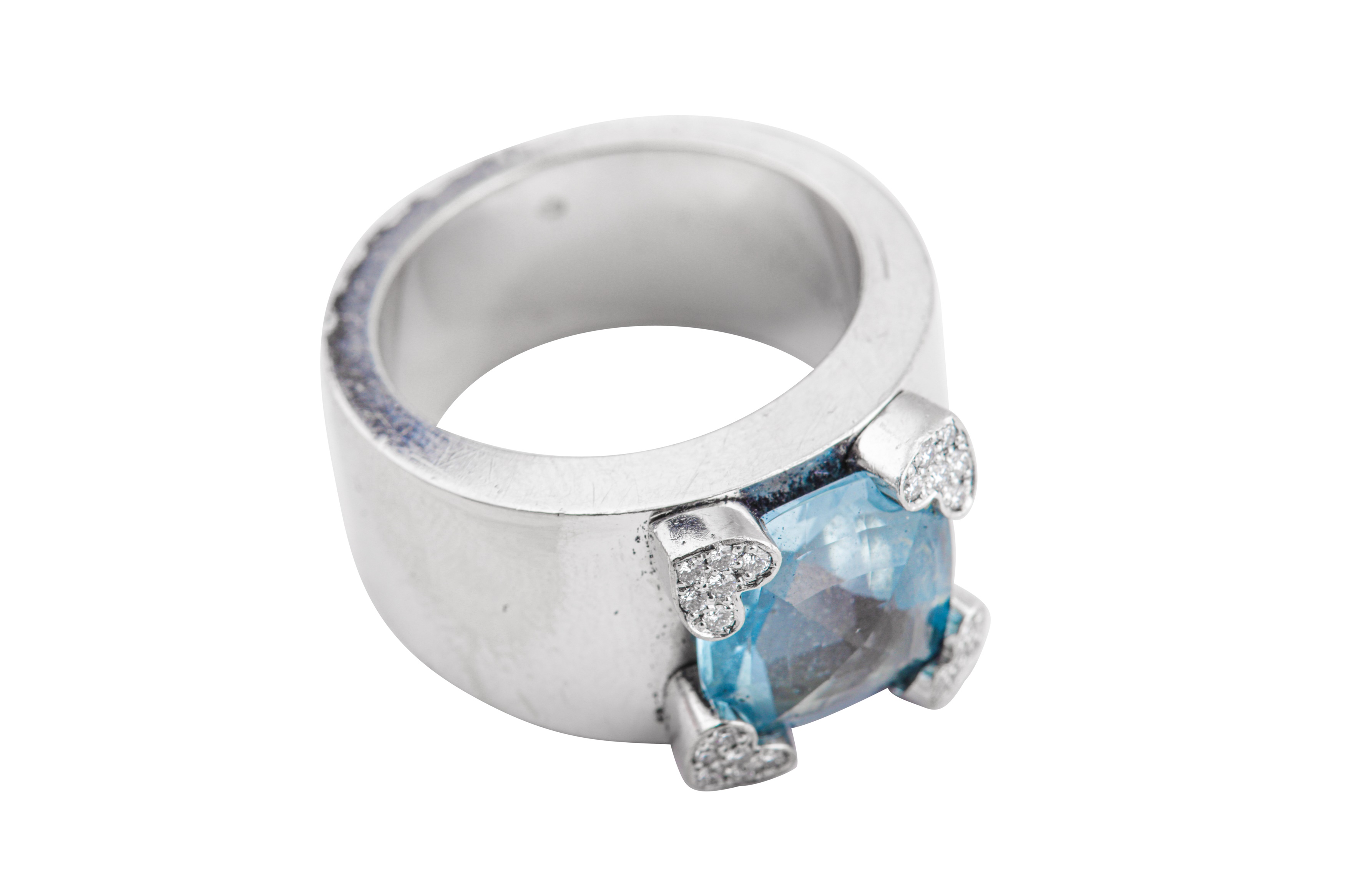 Lot 1247 - Chopard | A blue topaz and diamond ring
