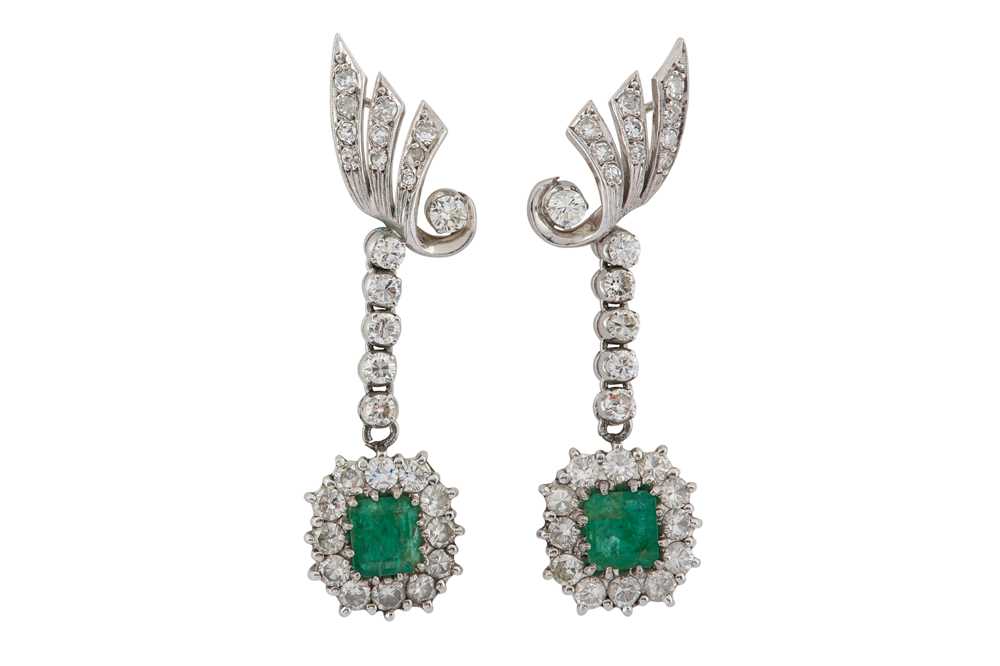 Lot 1225 - A pair of emerald and diamond earrings