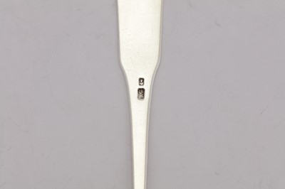 Lot 128 - An early 19th century Indian Colonial silver basting spoon, Madras circa 1810 by Robert Gordon (active circa 1802-22)