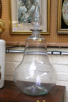 Lot 442 - A large clear glass baluster form flask with...