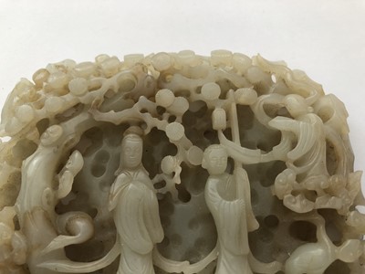 Lot 477 - A CHINESE PALE CELADON JADE 'IMMORTALS' CARVING.