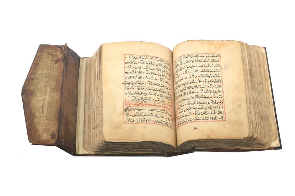 Lot 345 - An Incomplete Qur'an, from Al-Baqara (2:73) to Al-Mursalat (77:14)