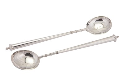 Lot 295 - A pair of George VI revivalist sterling silver basting spoons, London 1936 by Richard Comyns