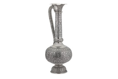 Lot 125 - A monumental early to mid- 20th century Anglo-Indian unmarked silver water ewer (surai), Delhi circa 1940