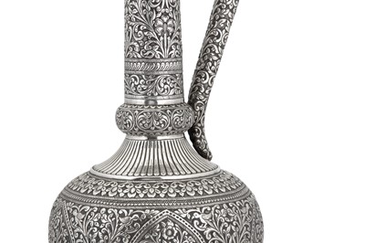 Lot 125 - A monumental early to mid- 20th century Anglo-Indian unmarked silver water ewer (surai), Delhi circa 1940