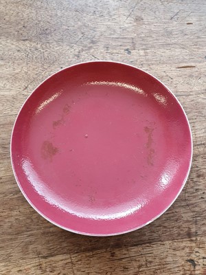 Lot 83 - A CHINESE COPPER-RED GLAZED DISH.