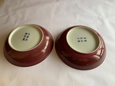 Lot 82 - A PAIR OF CHINESE COPPER RED GLAZED DISHES.